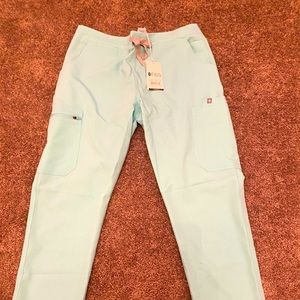 Never worn aqua colored  FIGS